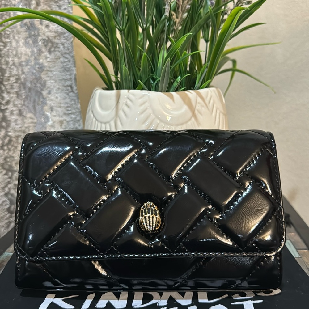 Kurt Geiger London
Extra Mini Shiny Leather Kensington Crossbody Bag